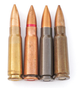 Caliber 7.62x39mm cartridge cases are principally of three types, left to right: brass, copper-washed steel and lacquered steel in varying shades of gray, OD or brown lacquer.