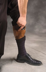 Calf holsters carry higher on the leg, as this older-model Bianchi holster illustrates. The revolver is the author's Model 36 Chief's Special with Berami Hip Grips, Tyler T-Grips and bobbed.