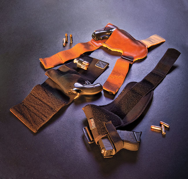 The author's partial collection of ankle holsters, collected over a 30-year police career. Padding between the holster body and the ankle is an absolute requirement.