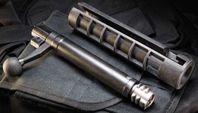 The triple-lug design is also three deep. This gives the bolt a short throw and lots of engagement surface when the bolt is closed. The bolt rides in a polymer sleeve that keeps out debris and slips into the back of the receiver.