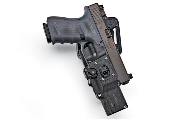 The open-­top design of the MasterFire RDH is compatible with all slide-mounted mini red dot sights and suppressor-­height sights. This unique OWB duty rig will also secure pistols with compensators and sound suppressors attached. $170.