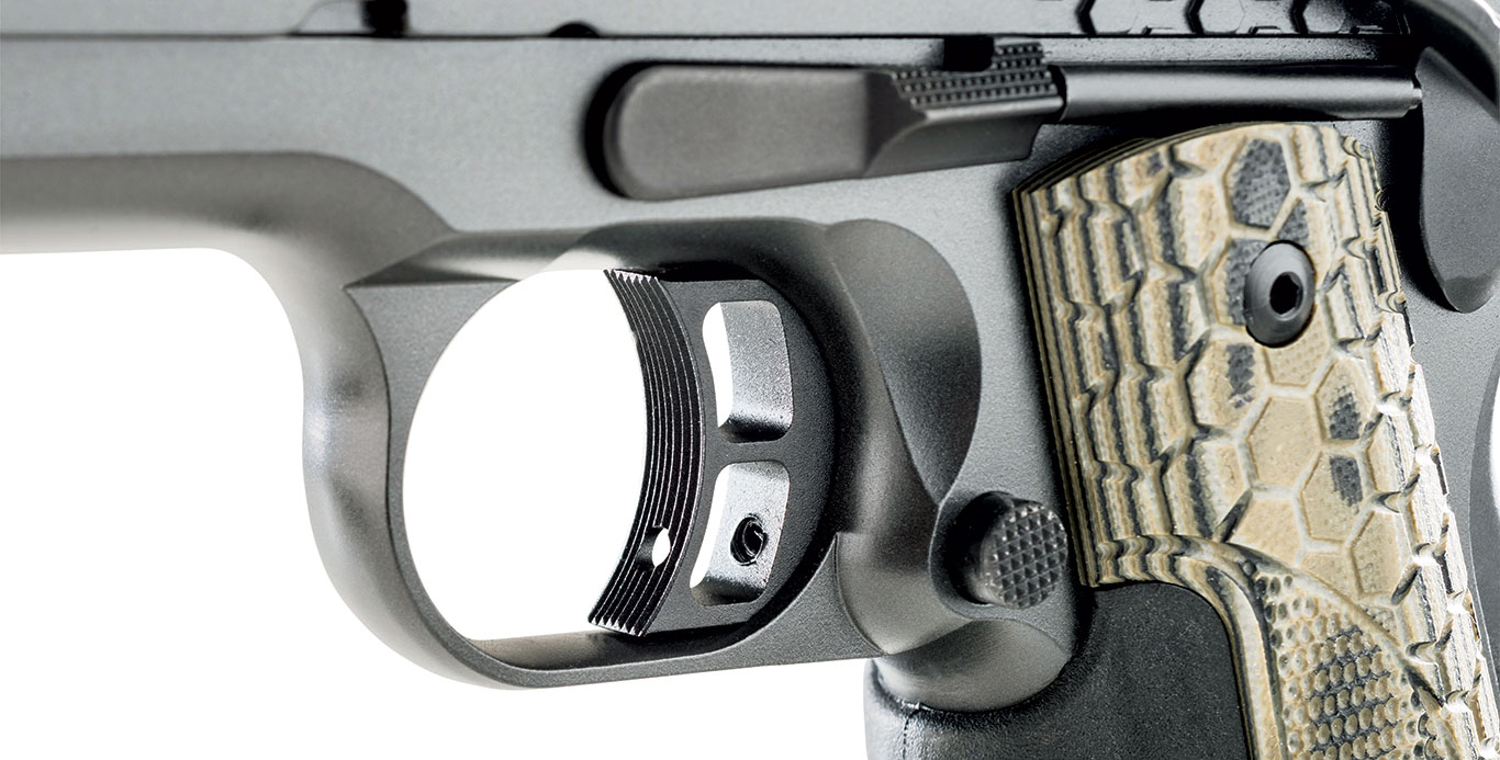 The trigger shoe is uniquely skeletonized with two ports, yet the touchpoint still wears serrations and offers access to adjust takeup with an Allen wrench. Other controls are familiar to 1911 shooters. 